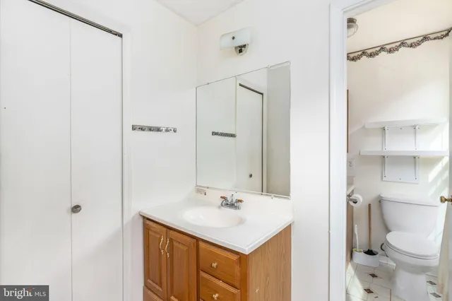 a view of a porch with wooden fence and floor