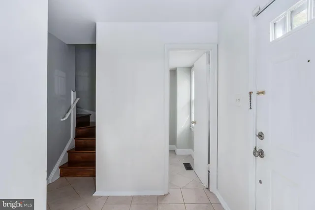 a view of a hallway with stairs