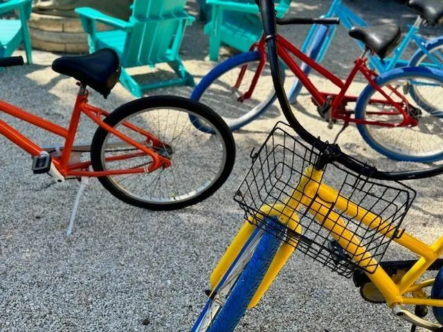 a backyard of a house with barbeque oven table and chairs