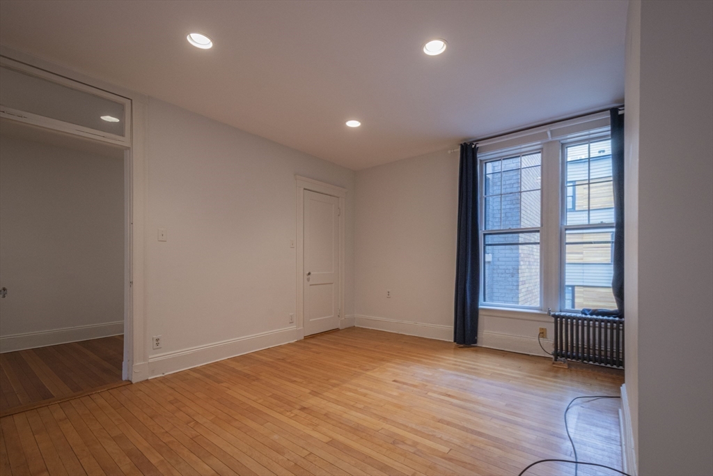 2 Newport Road, Unit 5 Cambridge, MA 02140 - Photo 12 of 18 a view of an empty room with a window