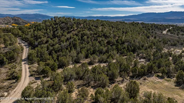 a view of ocean and mountain
