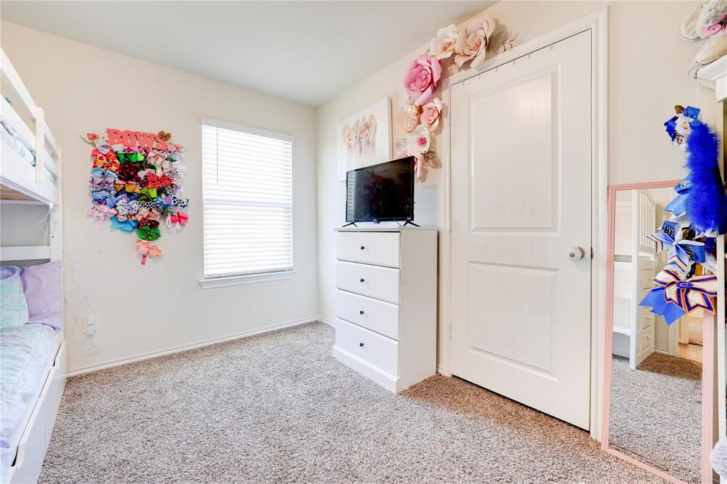 830 Rustic Way Josephine, TX 75189 - Photo 15 of 33 Bedroom featuring carpet floors and baseboards