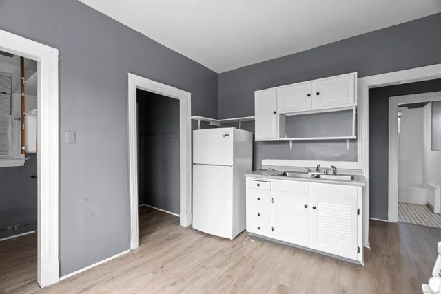 a room with storage and utility room