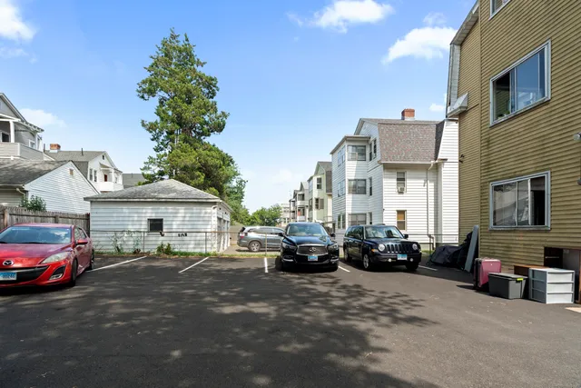 a car parked in front of a house