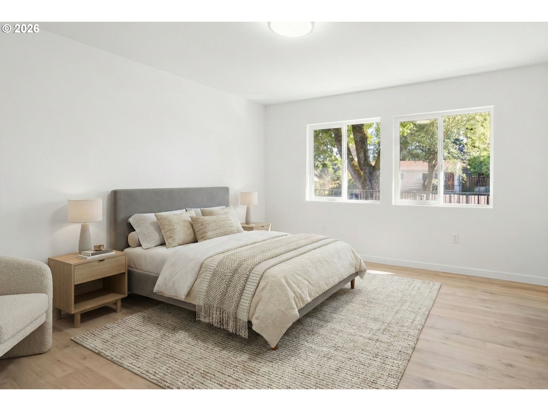142 Northeast 128th Avenue Portland, OR 97230 - Photo 14 of 43 a spacious bedroom with a bed lamp closet and window