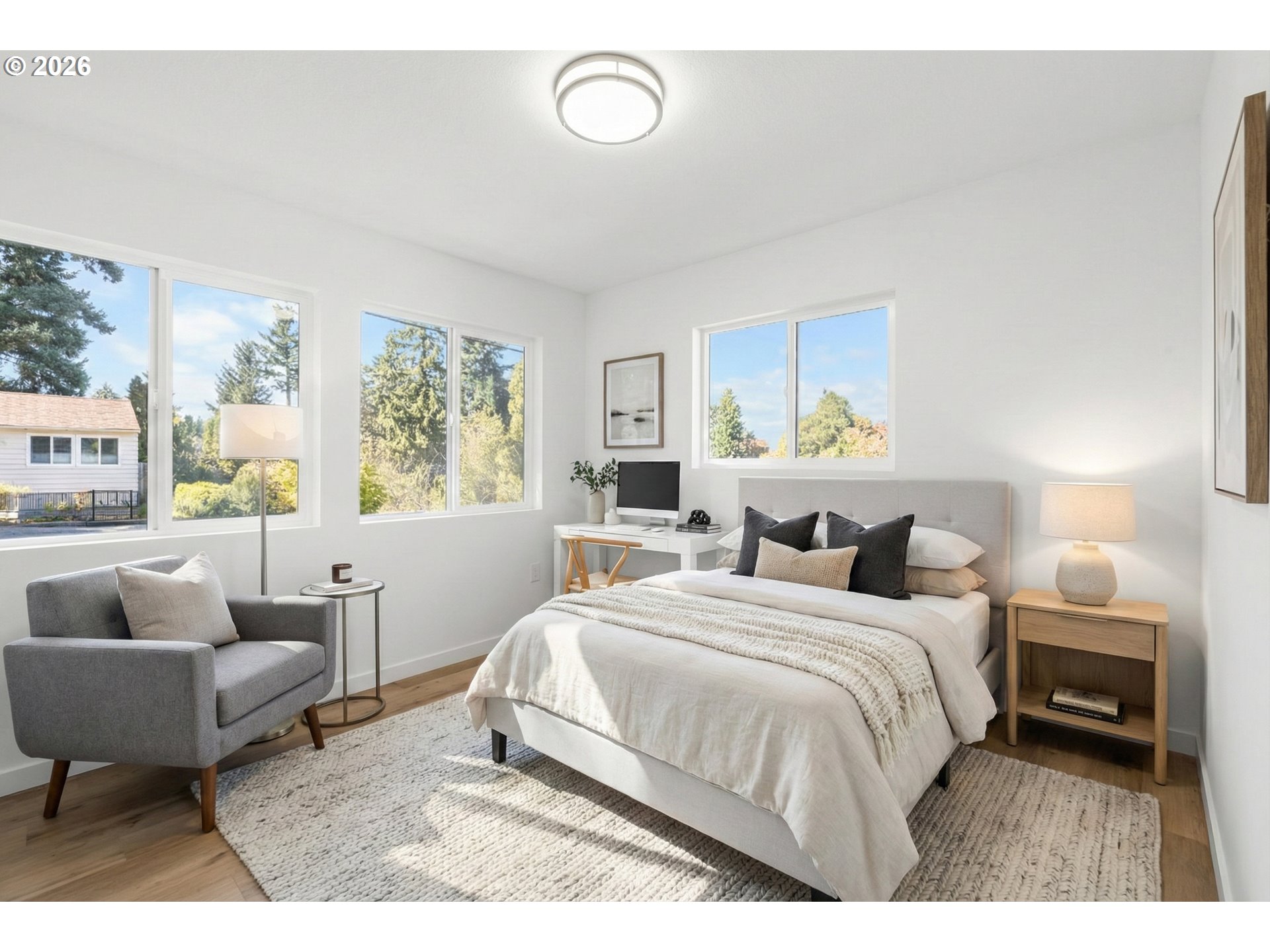 142 Northeast 128th Avenue Portland, OR 97230 - Photo 23 of 43 a bedroom with a bed a couch and a window