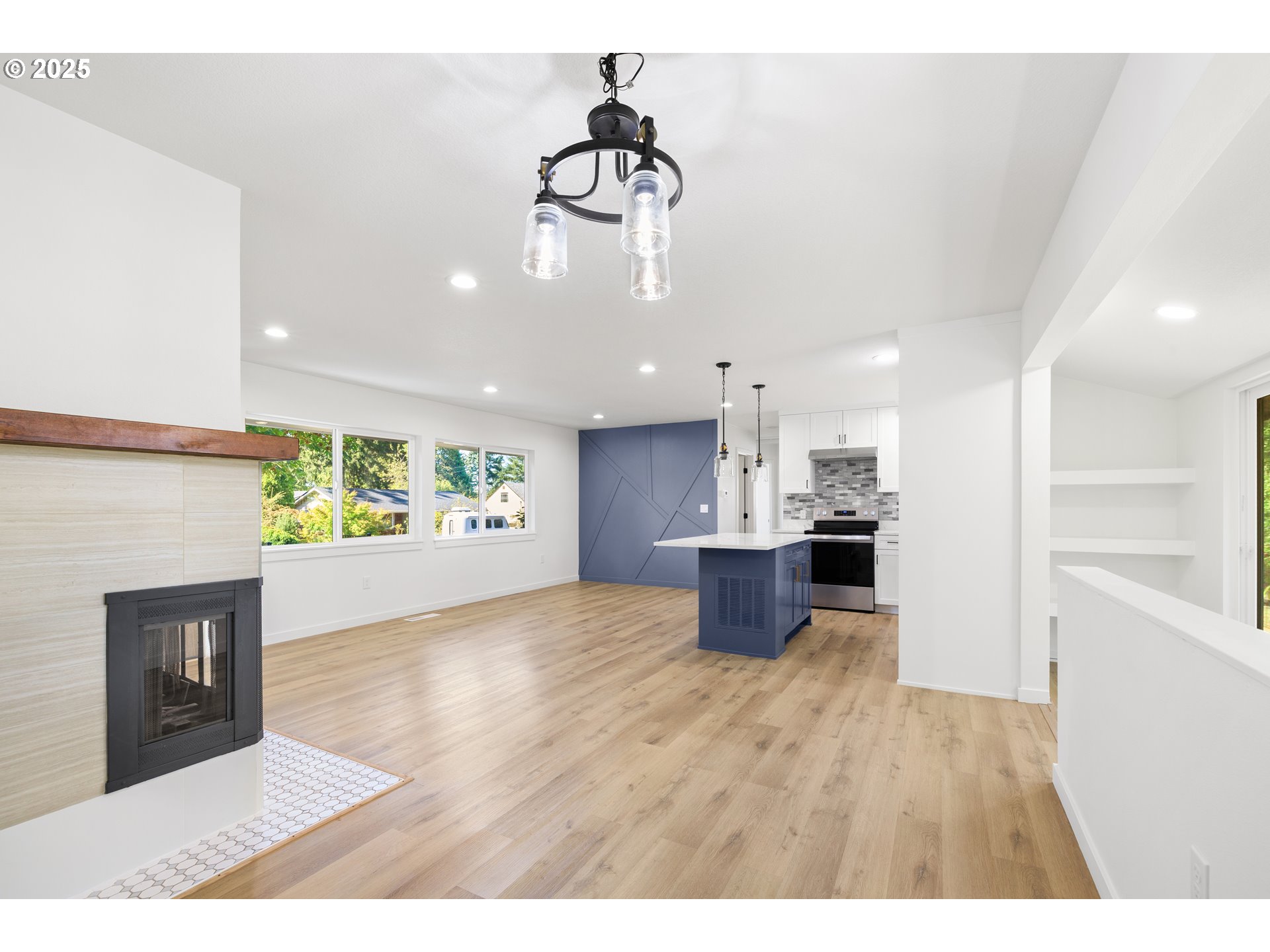 142 Northeast 128th Avenue Portland, OR 97230 - Photo 9 of 43 a view interior of a house and kitchen view with wooden floor