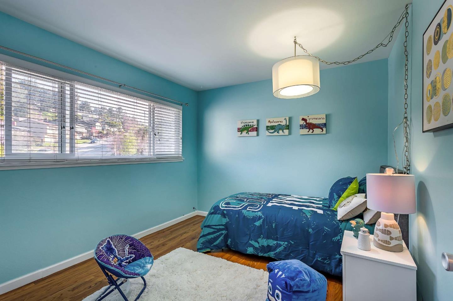 3 Yellowstone Way Pacifica, CA 94044 - Photo 15 of 21 a living room with furniture and a window