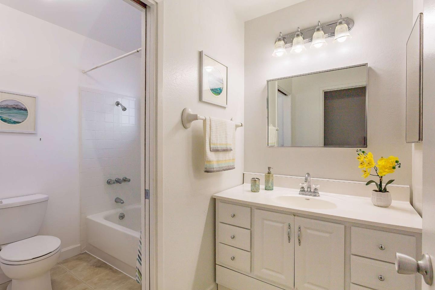 3 Yellowstone Way Pacifica, CA 94044 - Photo 18 of 21 a bathroom with a sink a toilet and shower