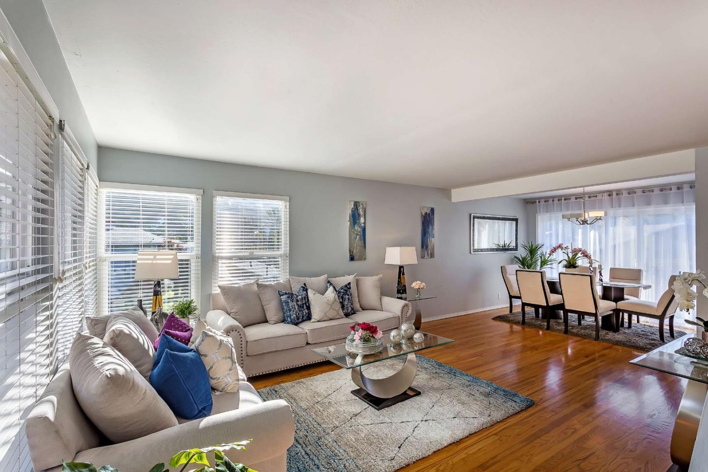 3 Yellowstone Way Pacifica, CA 94044 - Photo 2 of 21 a living room with furniture and wooden floor