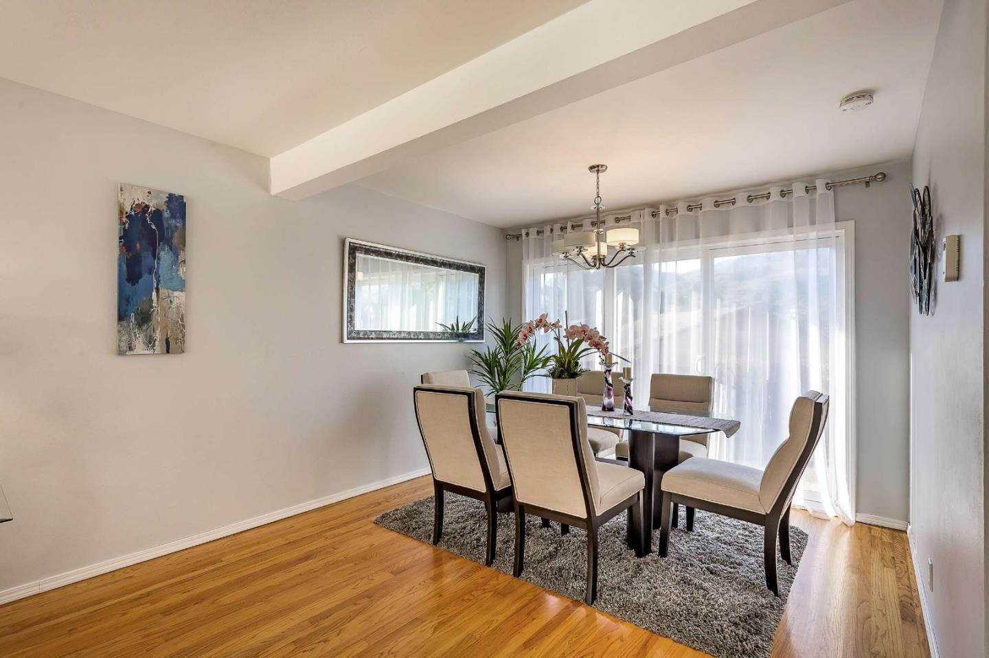 3 Yellowstone Way Pacifica, CA 94044 - Photo 6 of 21 a view of a dining room with furniture and window