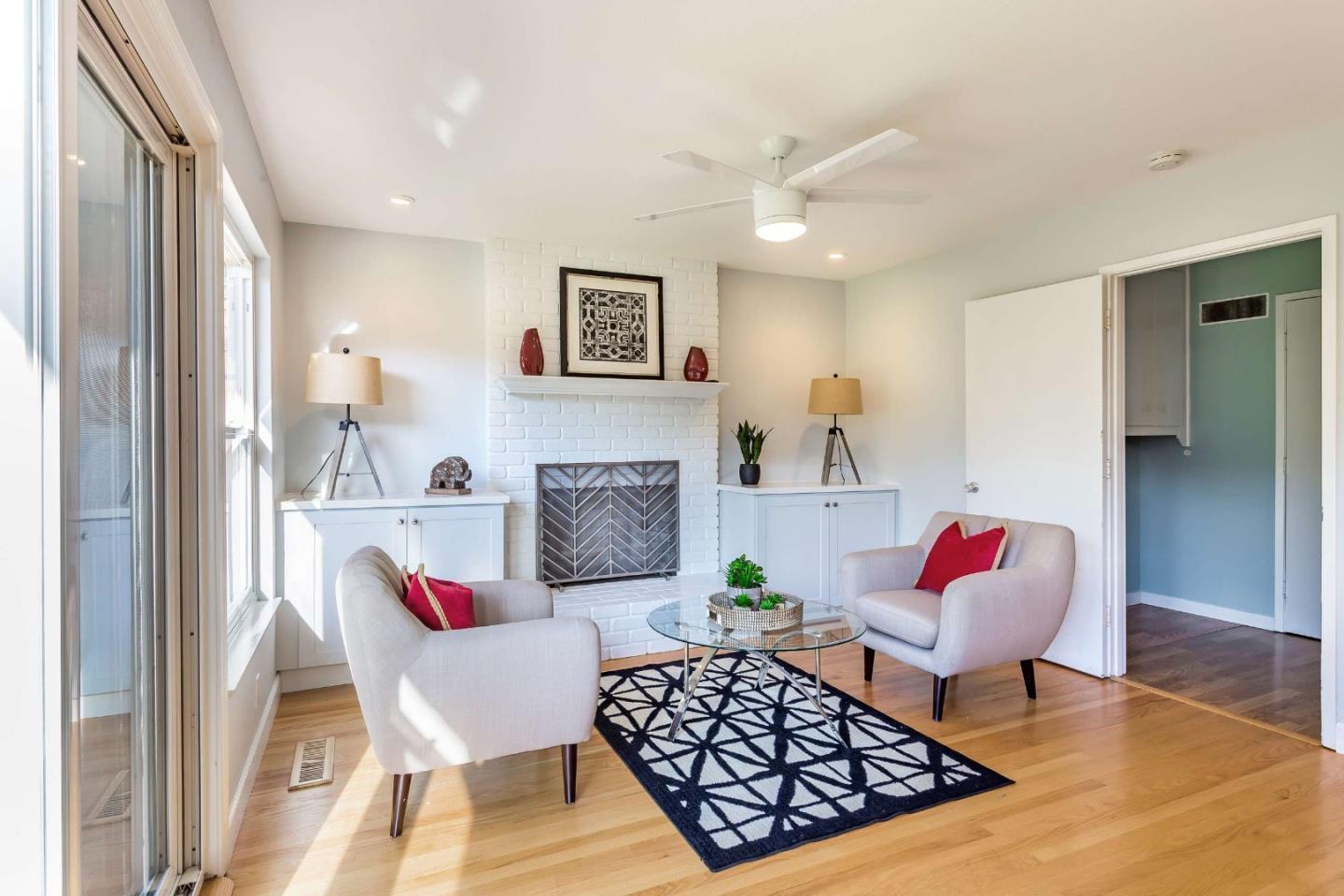 3 Yellowstone Way Pacifica, CA 94044 - Photo 10 of 21 a living room with furniture and a fireplace