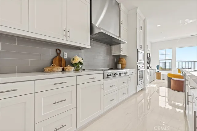 a view of a living room with furniture