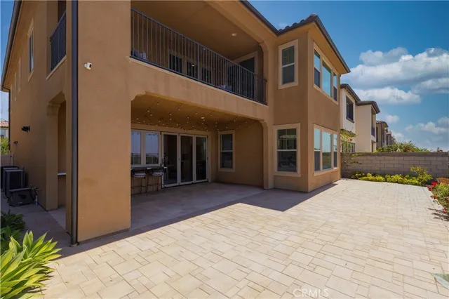 a spacious bathroom with a double vanity sink and a mirror