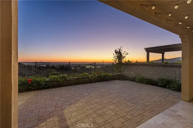 a view of a livingroom with furniture and a window