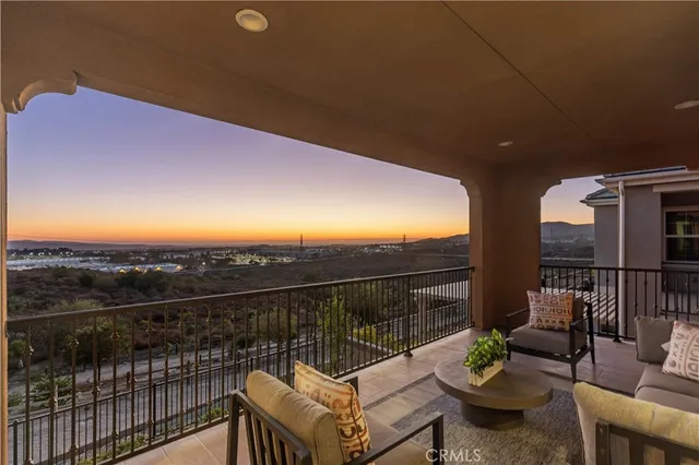 an empty room with closet and windows
