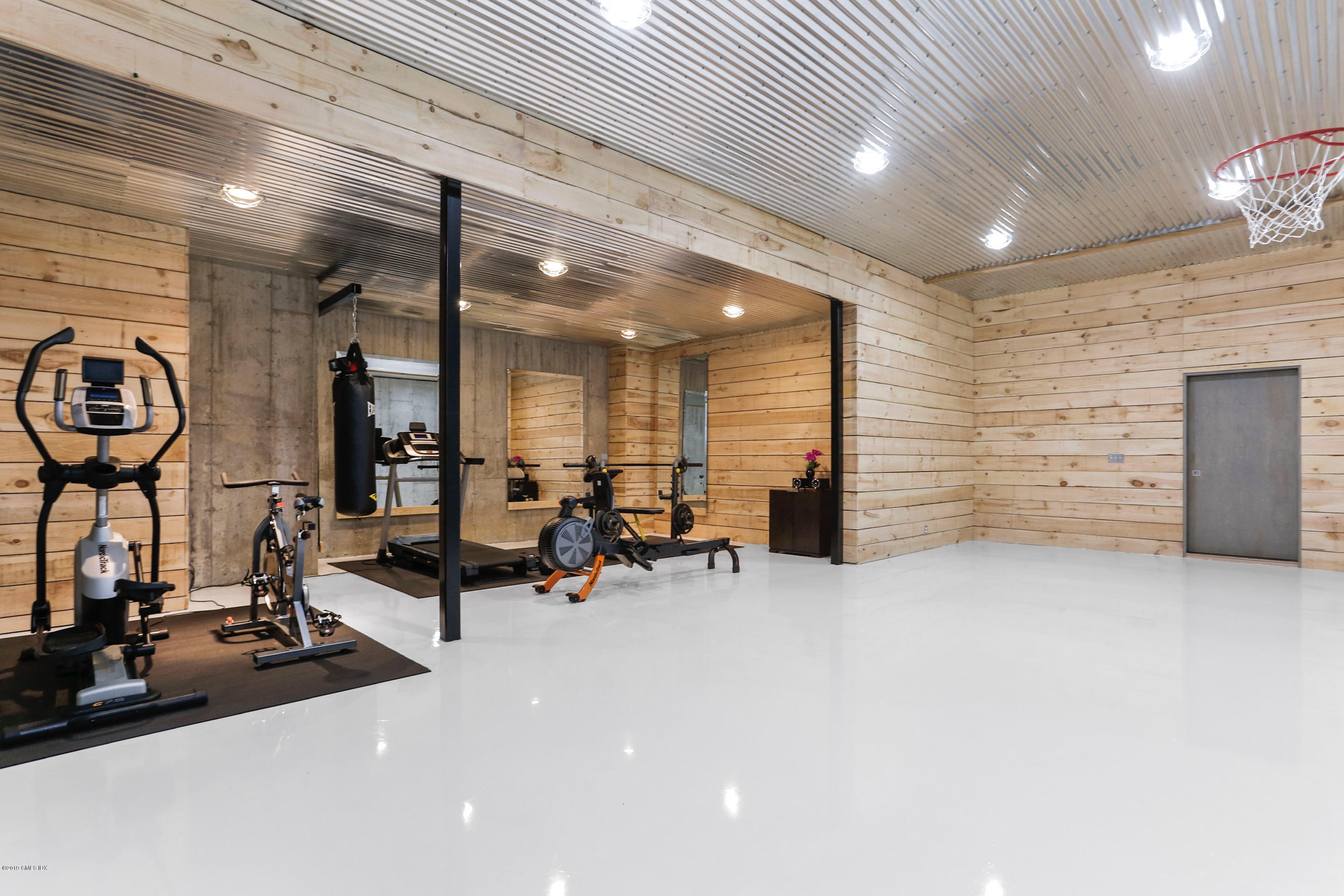 271 Valley Road Cos Cob, CT 06807 - Photo 16 of 42 a view of a room with gym equipment