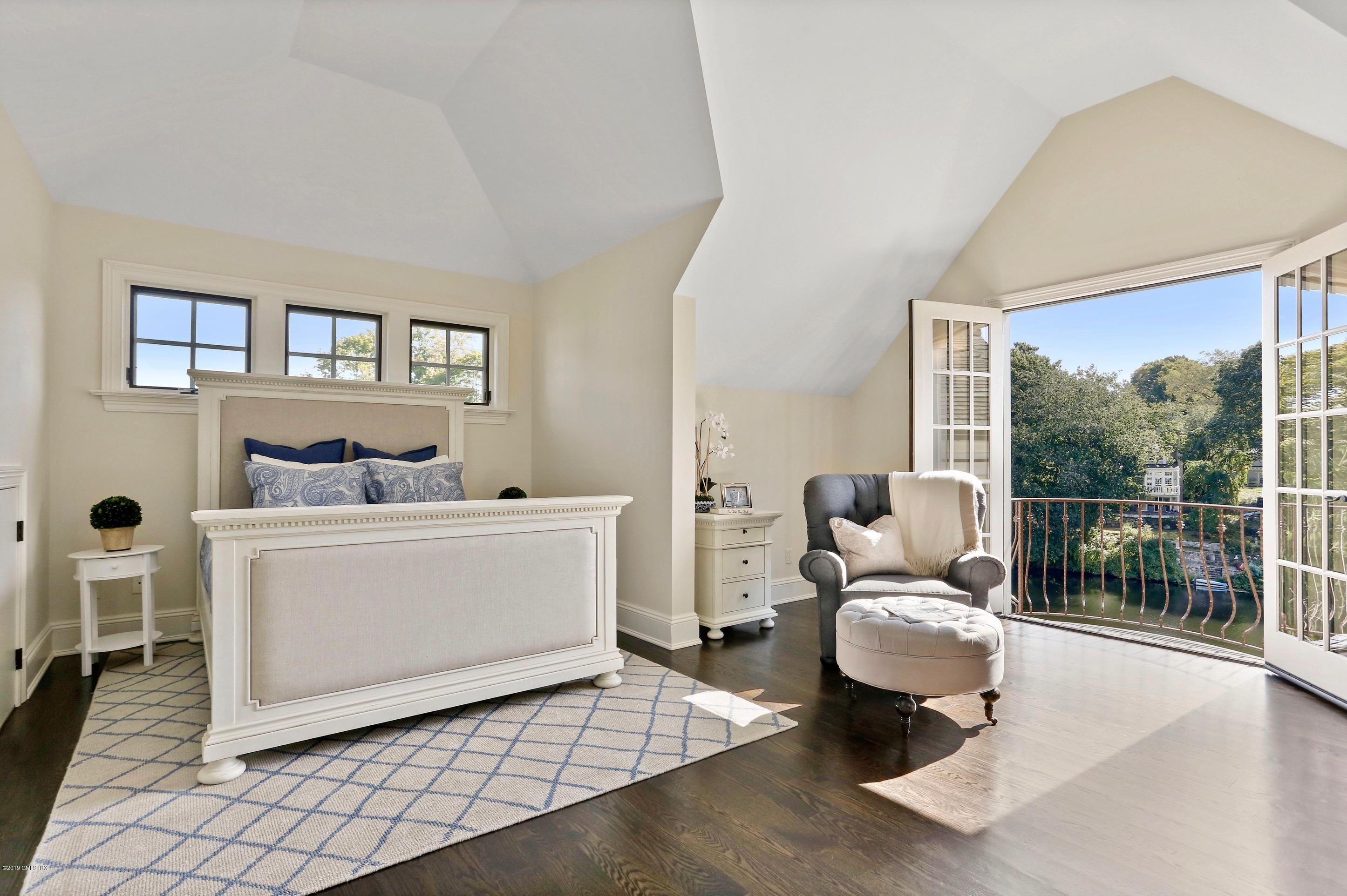271 Valley Road Cos Cob, CT 06807 - Photo 23 of 42 a living room with furniture and a table