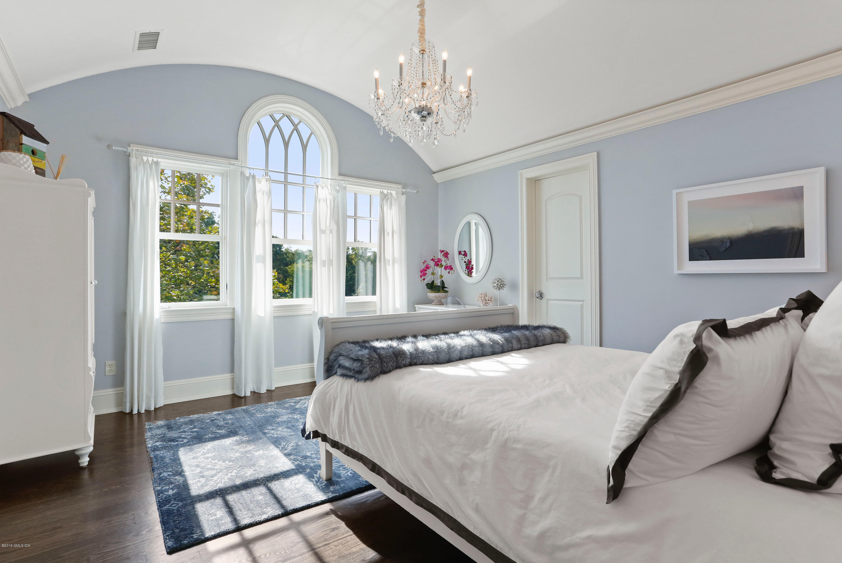 271 Valley Road Cos Cob, CT 06807 - Photo 26 of 42 a bedroom with a large bed and a window