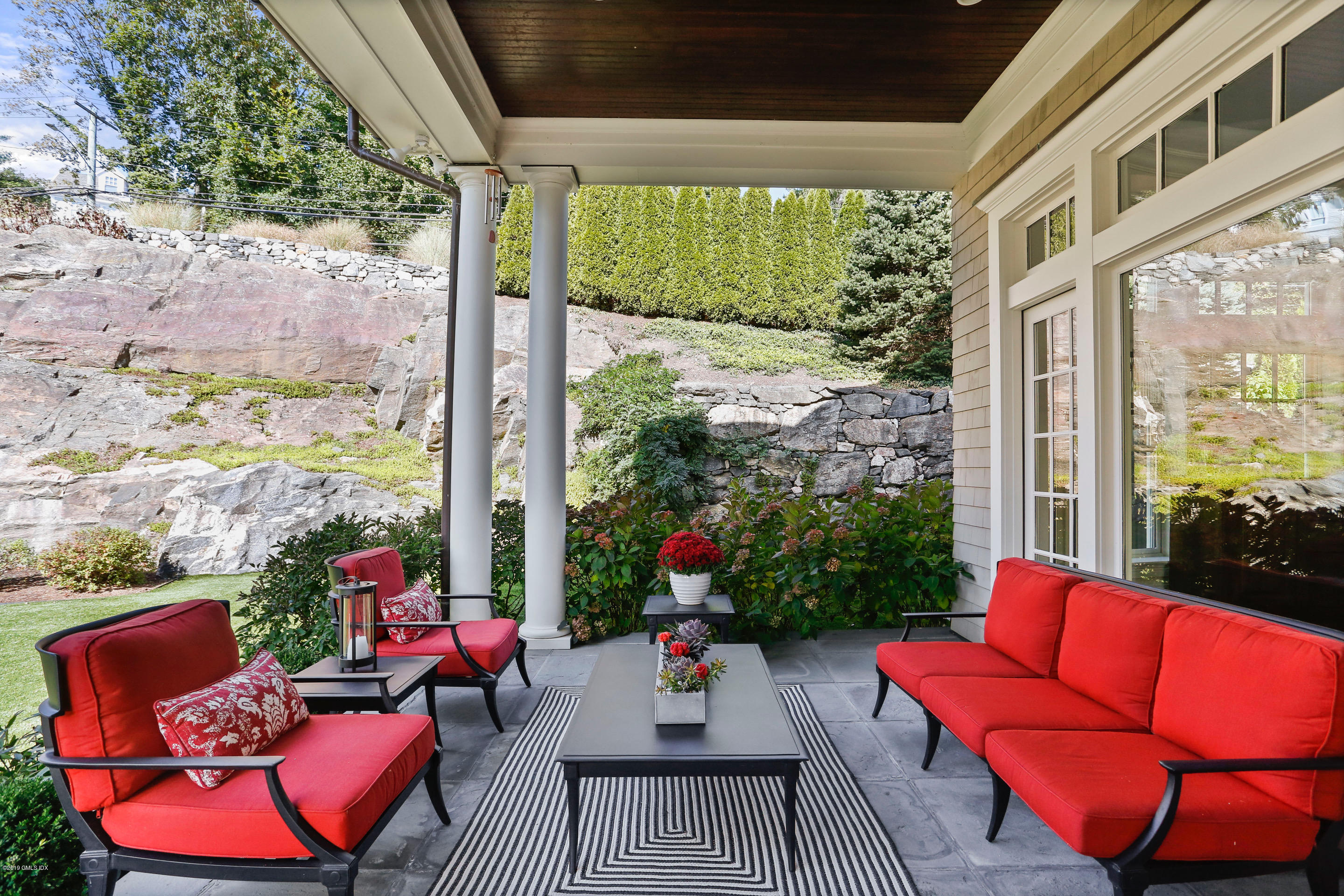 271 Valley Road Cos Cob, CT 06807 - Photo 31 of 42 a outdoor living space with furniture and garden view