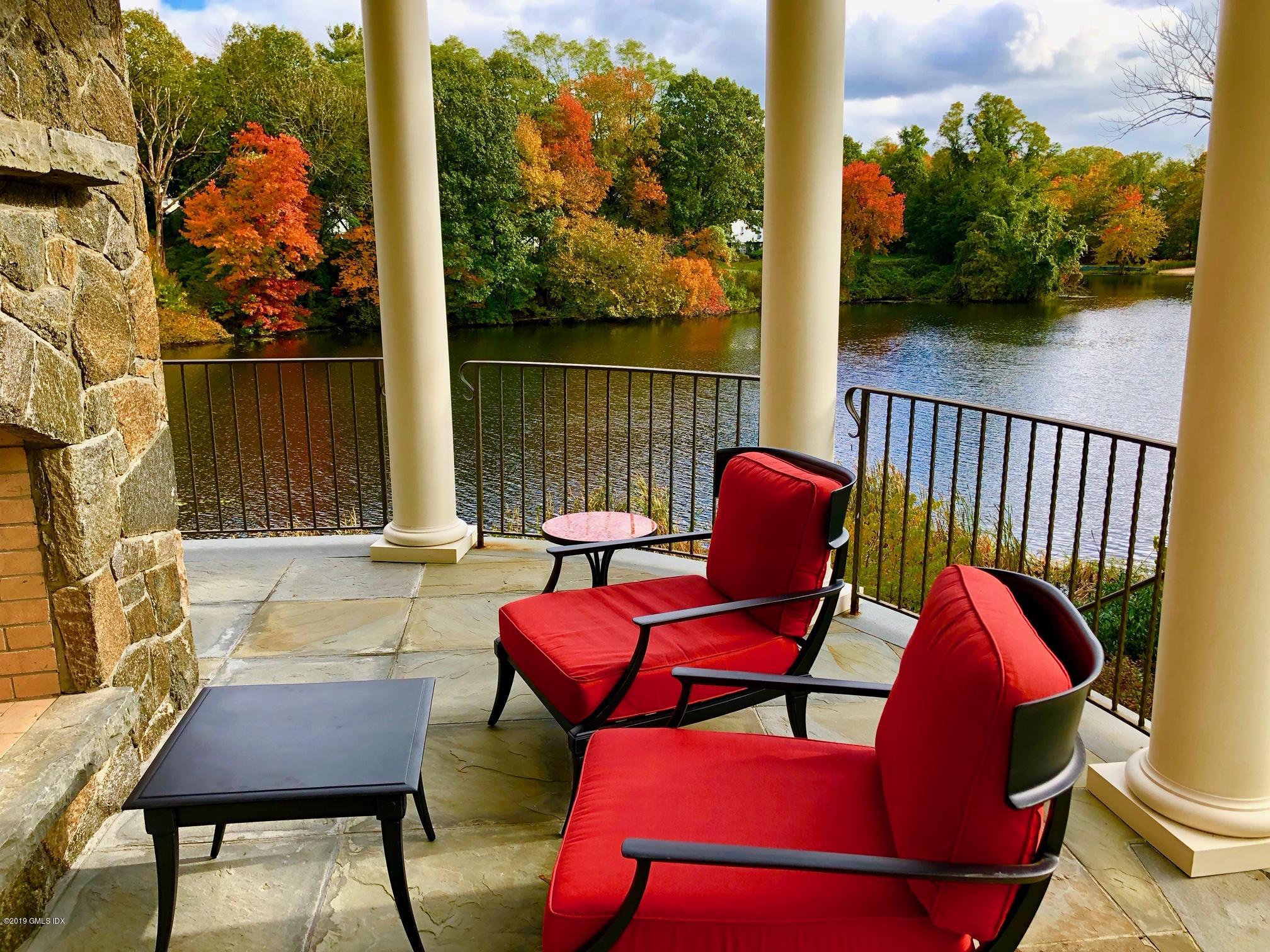 271 Valley Road Cos Cob, CT 06807 - Photo 33 of 42 a outdoor sitting area with furniture and wooden floor