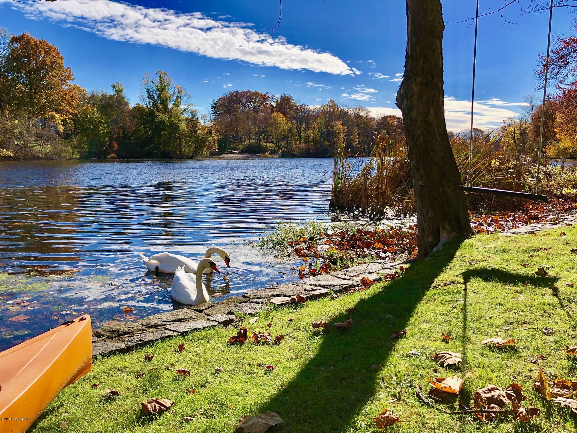 271 Valley Road Cos Cob, CT 06807 - Photo 42 of 42 a view of a lake with a lake