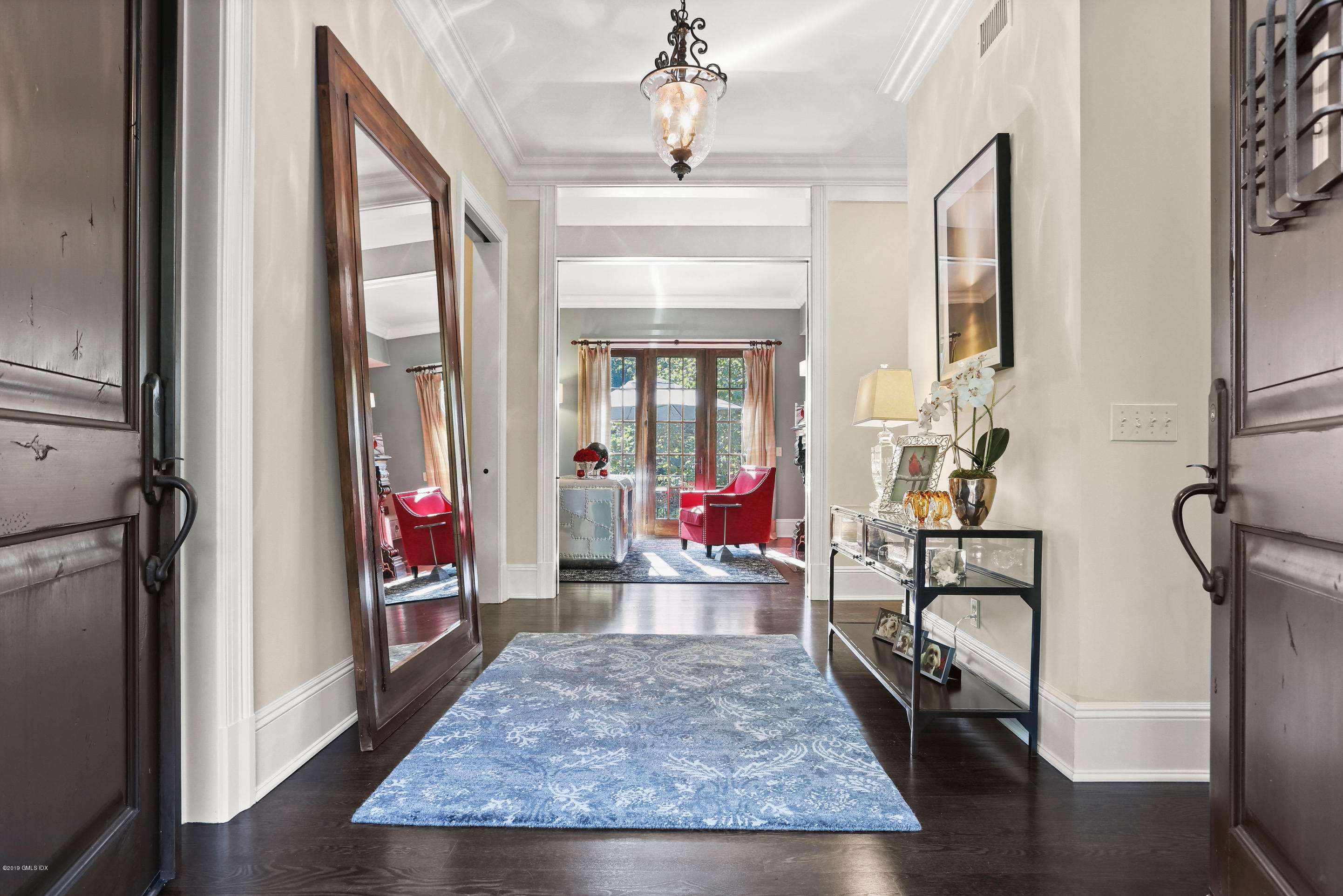 271 Valley Road Cos Cob, CT 06807 - Photo 5 of 42 a living room with furniture and a fireplace