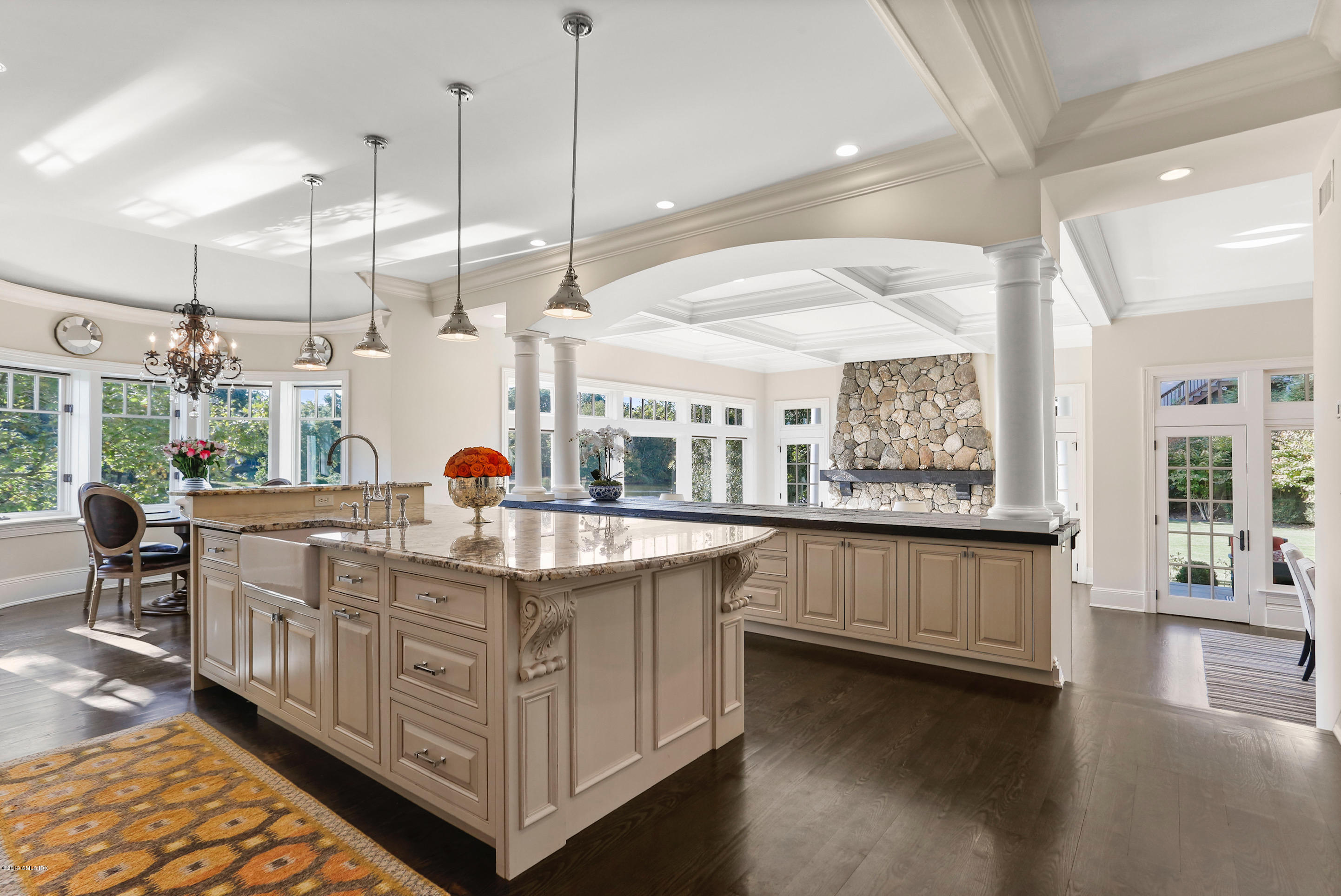 271 Valley Road Cos Cob, CT 06807 - Photo 7 of 42 a kitchen with stainless steel appliances granite countertop a stove and a wooden floors