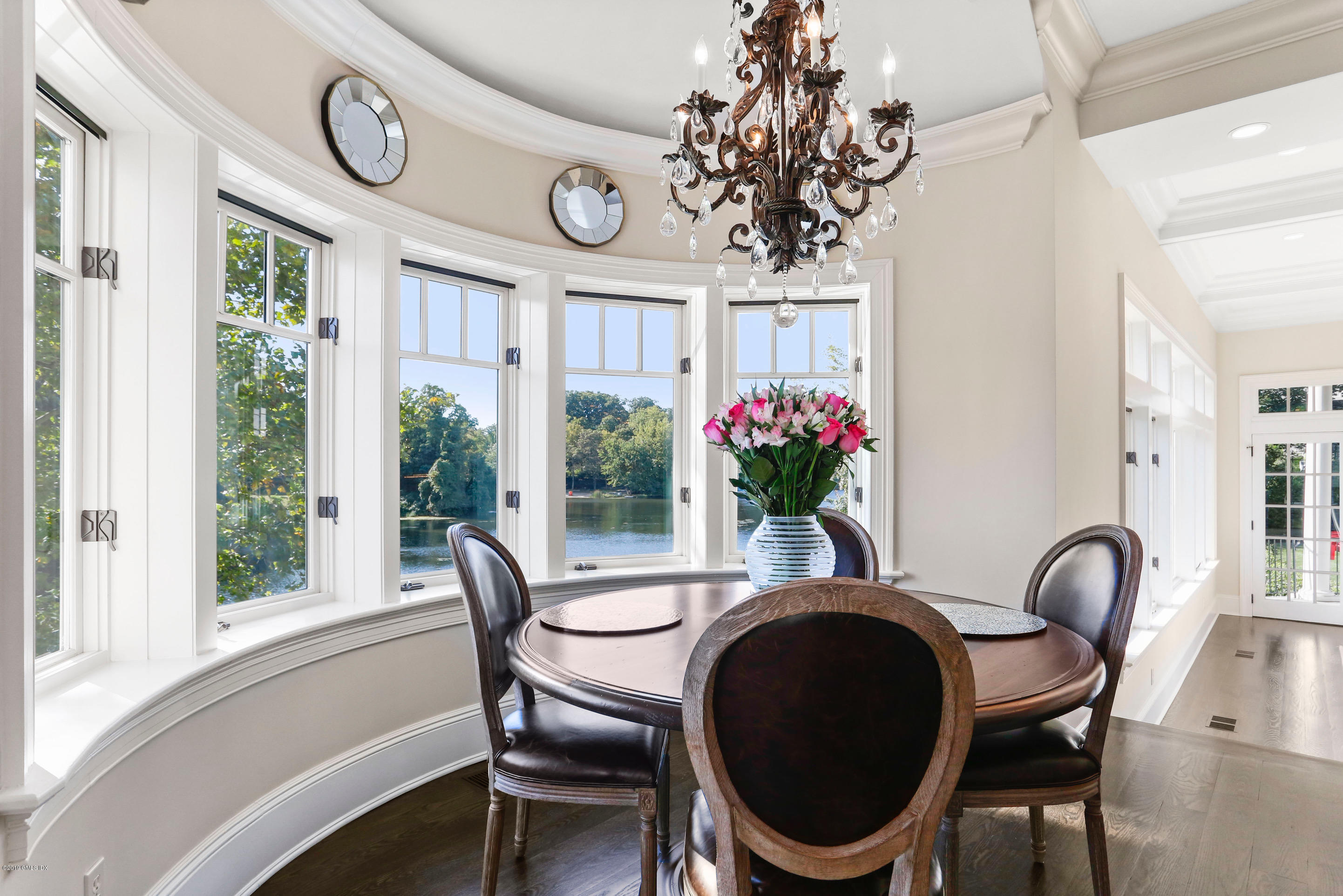 271 Valley Road Cos Cob, CT 06807 - Photo 9 of 42 a view of a dining room with furniture window and wooden floor