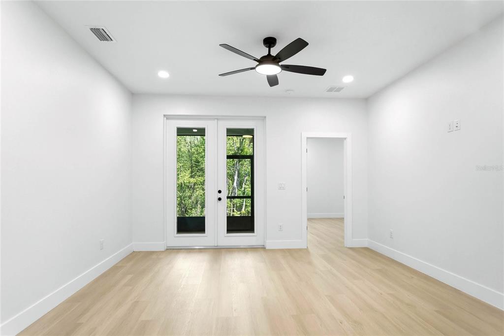 126 Canby Circle Spring Hill, FL 34606 - Photo 14 of 37 a view of an empty room with a window
