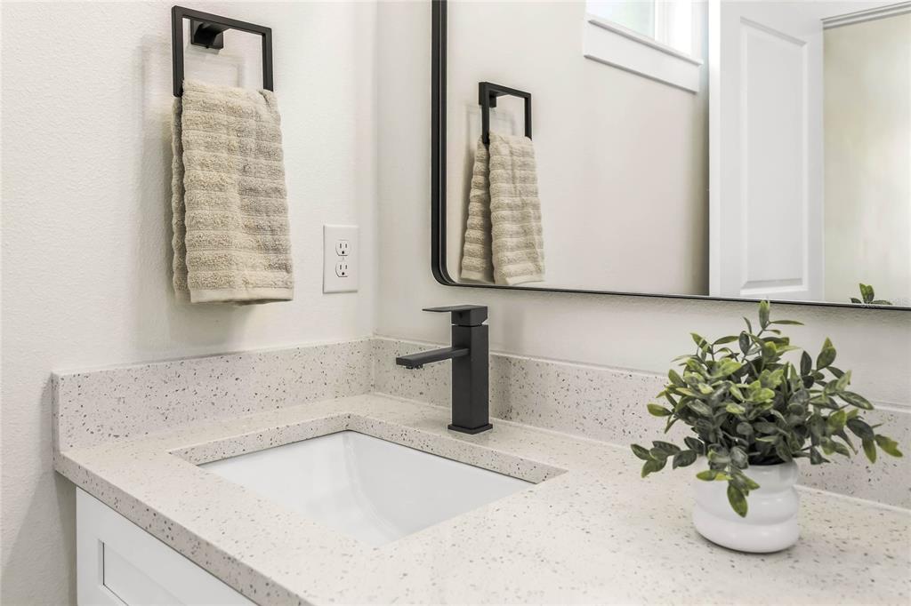 126 Canby Circle Spring Hill, FL 34606 - Photo 27 of 37 a bathroom with a sink and a mirror