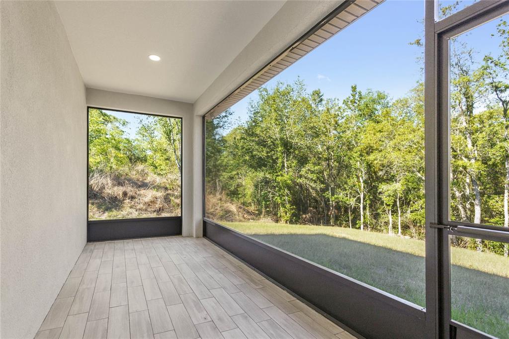 126 Canby Circle Spring Hill, FL 34606 - Photo 29 of 37 a view of a garden from a window
