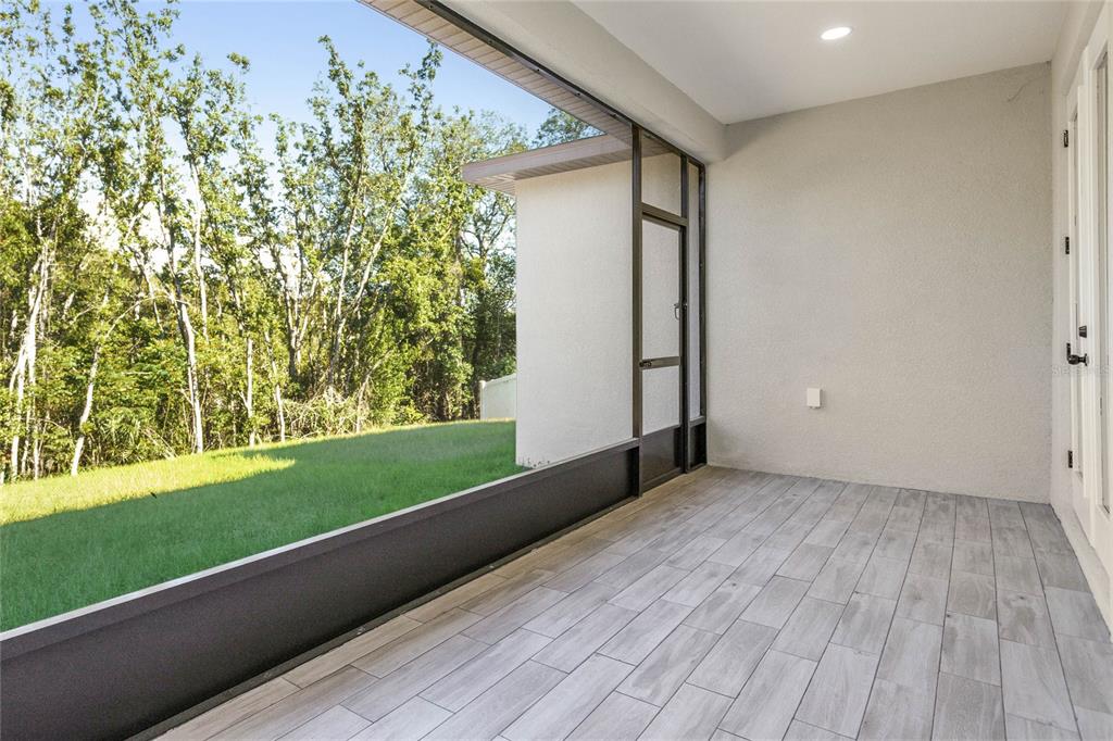 126 Canby Circle Spring Hill, FL 34606 - Photo 30 of 37 a view of outdoor space with garden