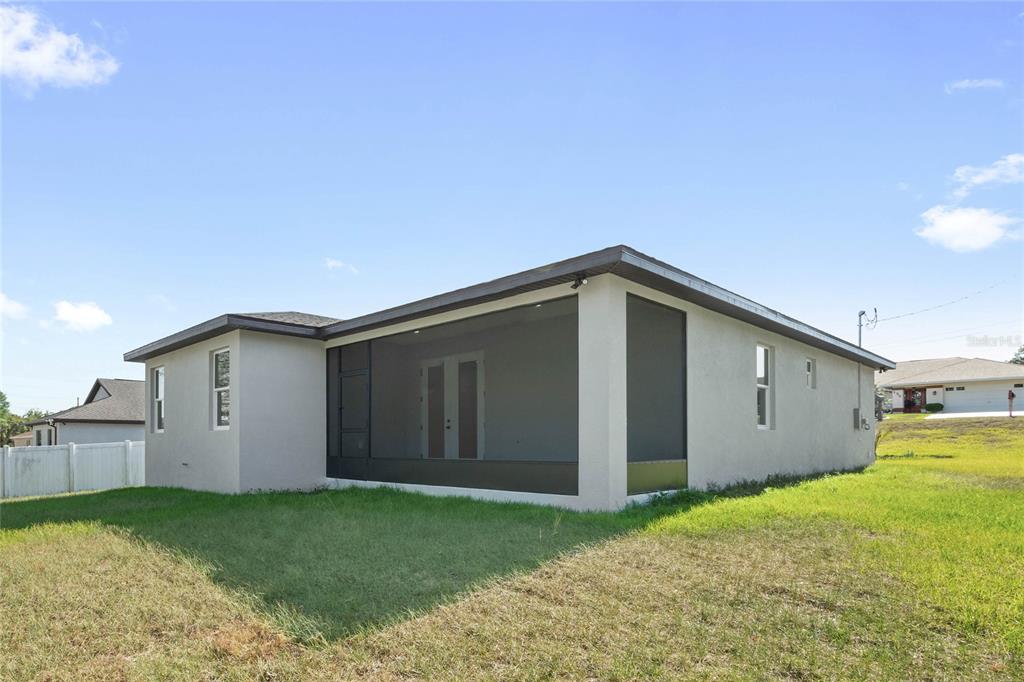 126 Canby Circle Spring Hill, FL 34606 - Photo 31 of 37 a view of a house with backyard