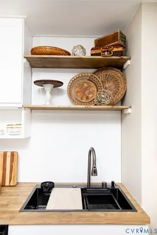 a view of a dining room with furniture and a table
