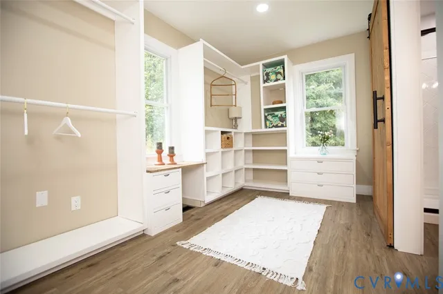 a bathroom with a toilet a sink and bathtub