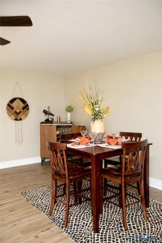 a view of a kitchen with wooden floor