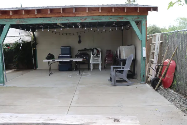 a view of a lounge chairs in the patio