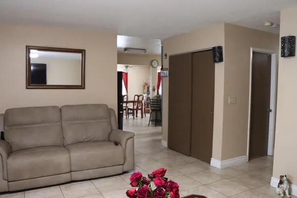 a living room with furniture and a window