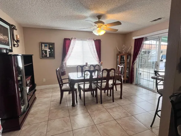 a dining room well furnished