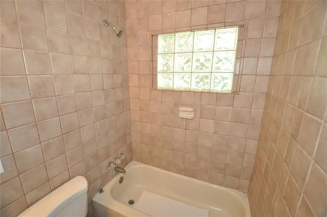 a bathroom with a bathtub