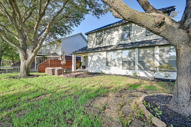 front view of a house with a big yard