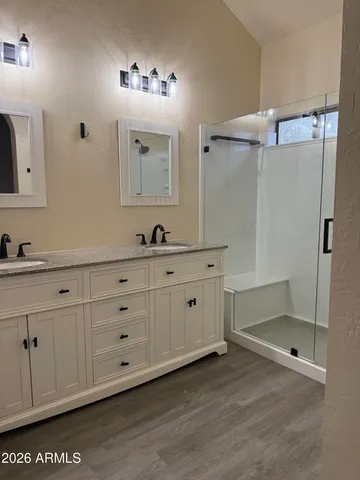 a bathroom with a toilet a sink and bathtub