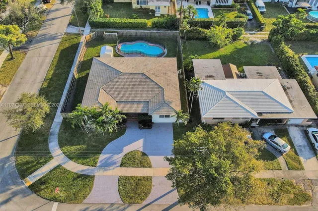a bedroom with a bed and a desk