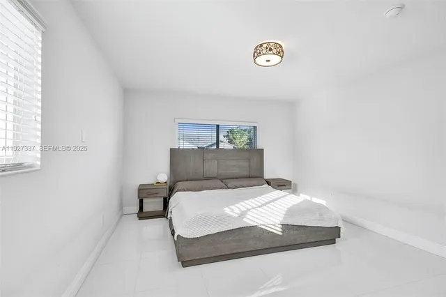 an aerial view of a city with lots of residential buildings