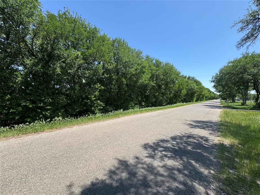 0 Clater Powell Road, Unit LOT 3 Waco, TX 76705 - Photo 2 of 7 a view of a road with a yard