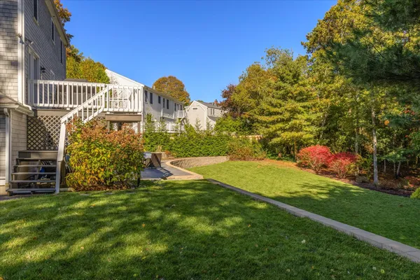 aerial view of a house with yard swimming pool and outdoor seating