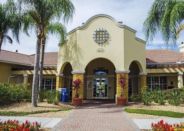 an aerial view of a swimming pool patio and outdoor seating