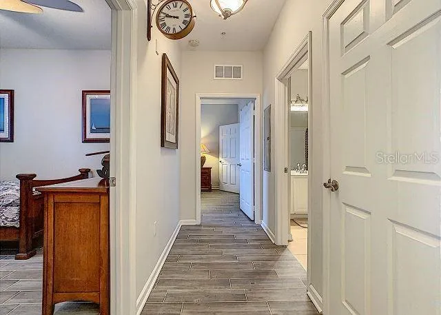 a view of a hallway with washer and dryer