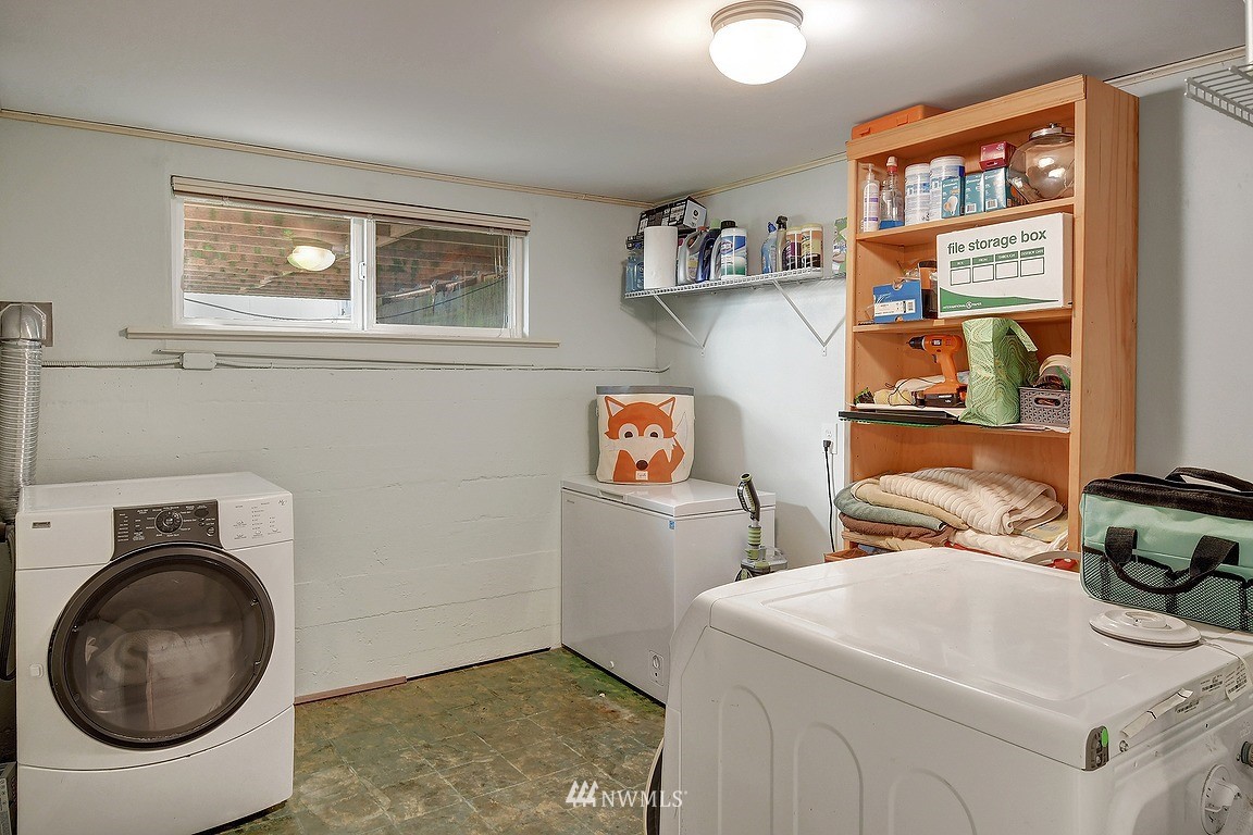 8202 37th Avenue Southwest Seattle, WA 98126 - Photo 18 of 27 a utility room with dryer and washer